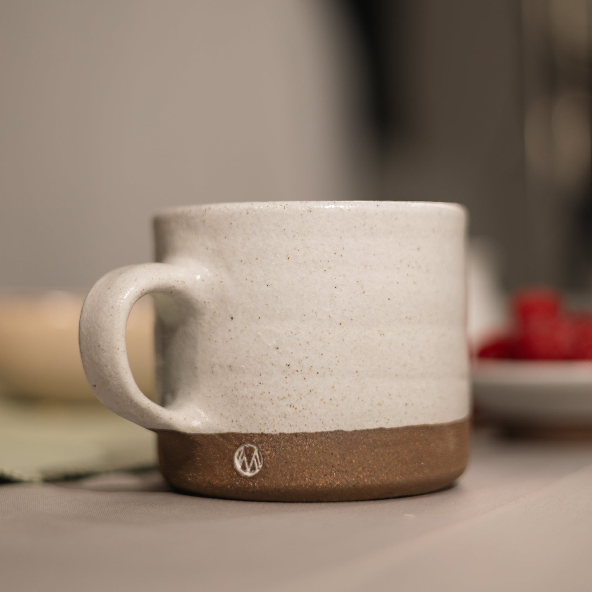 12oz hand made terracotta mug glazed in a white glaze